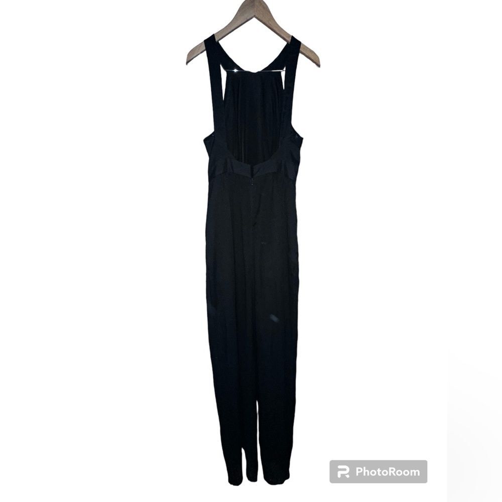 BCBGeneration Black Jumpsuit Size 6, with pockets.
